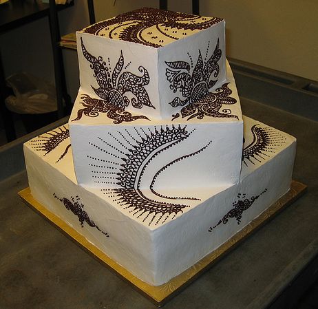 Three tier square wedding cake with tribal patterns.JPG