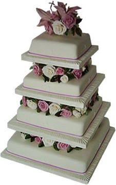 4 Tier Wedding Cake with white and pink roses