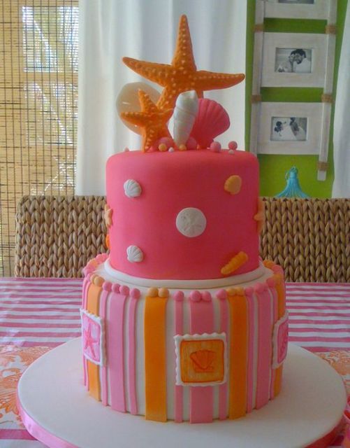 Two tier birthday cake with starfish.JPG