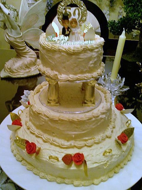 50th Anniversary cake with topper.jpg