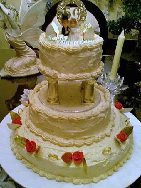 50th Anniversary cake with topper.jpg