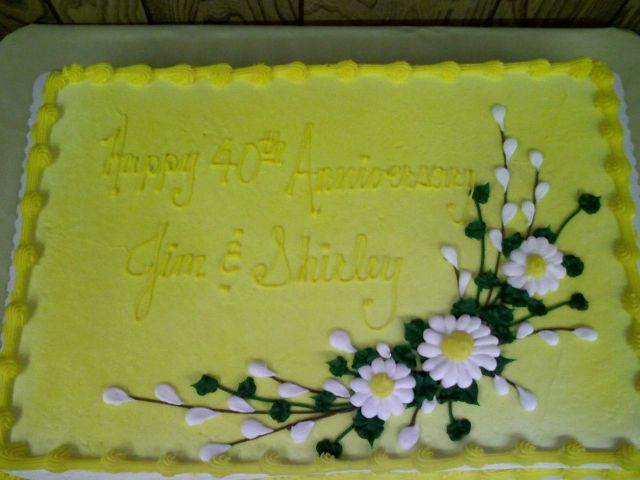 anniversary party cake in very bright yellow.jpg