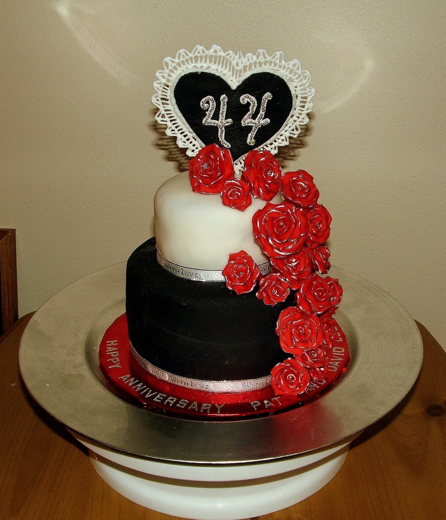 black and white anniversary cakes ideas with bright red flowers.jpg