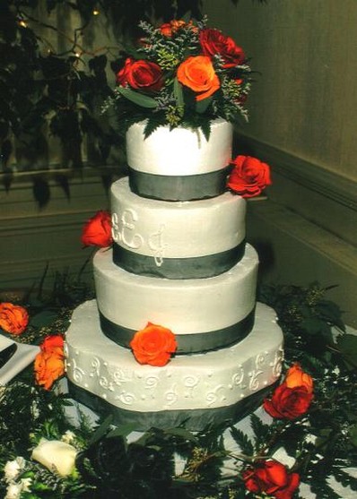 Wedding cake in white with four tier and fresh flowers