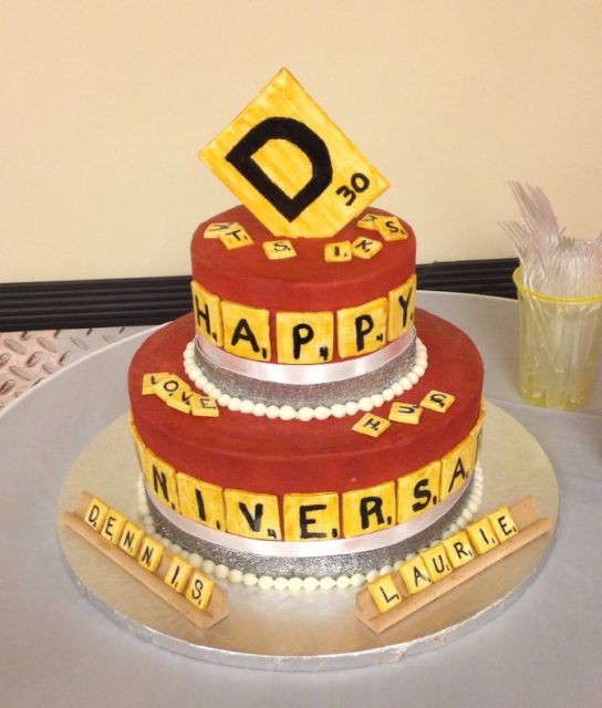 2 tier Scrabble crossword puzzle round anniversary cake in red.JPG