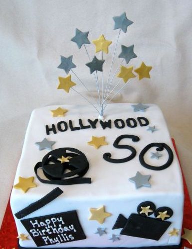 White square movie theme cake for Fiftieth birthday.JPG