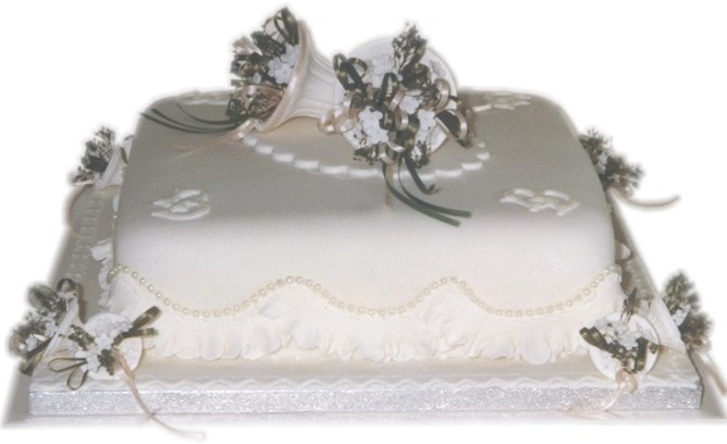 Square wedding cake with girly decor