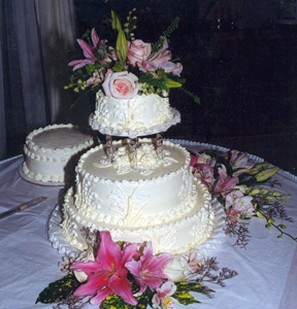 Image of Wedding Cake with fresh pink flowers