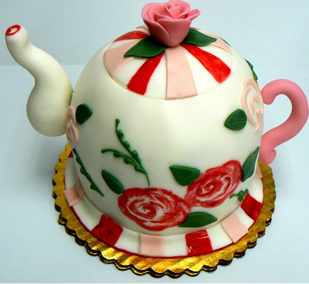 Detailed white teapot cake with pink rose.JPG