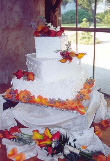 wedding cake with red and orange colors