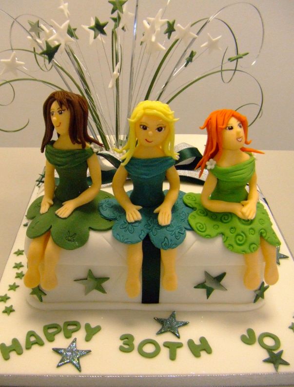 White 30th birthday cake with woman and her two friends.JPG
