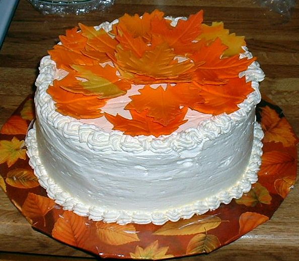 Autumn cake with full of bright orange leaves.JPG