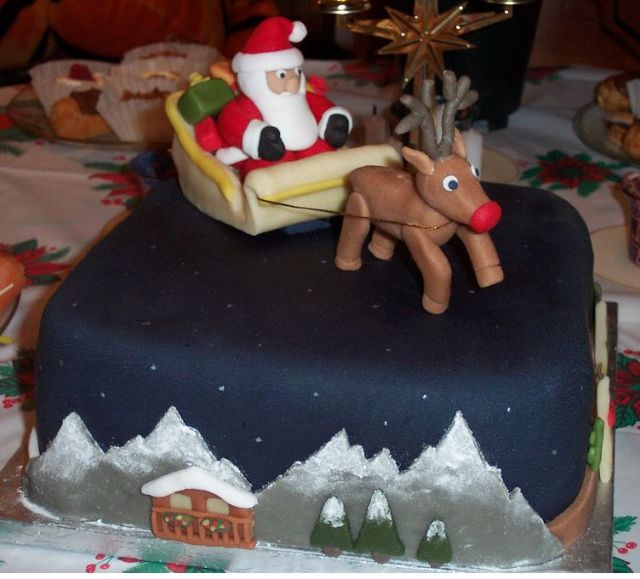 Decorating Christmas cake with Santa on the road.JPG