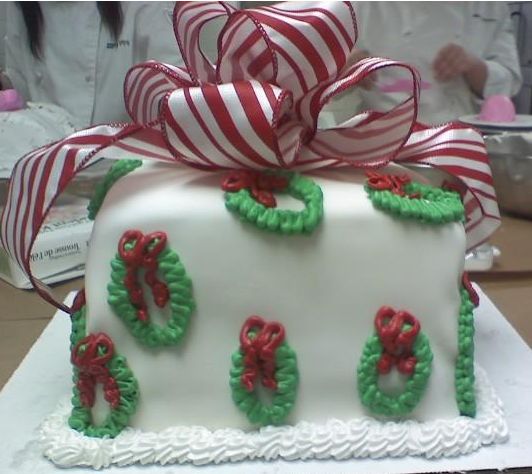 Square gift christmas cake with big red and white bow.JPG