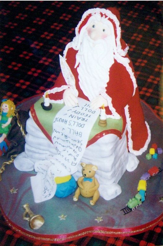 Christmas cake ideas with big Santa figure.JPG