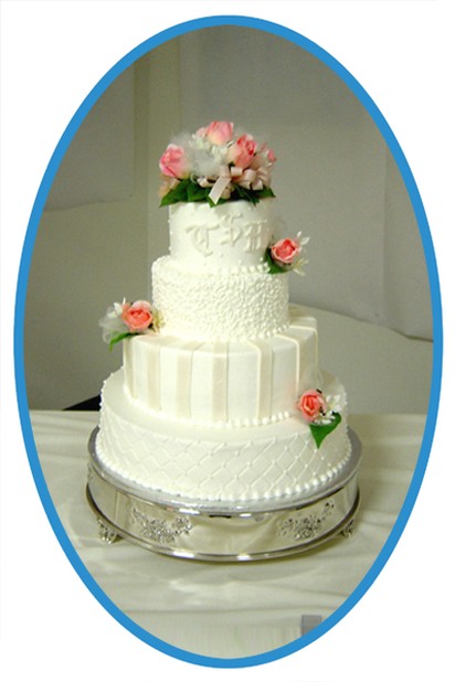 four 4 tier wedding with flowers