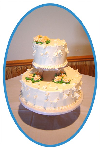 wedding cake with flowers in yellow