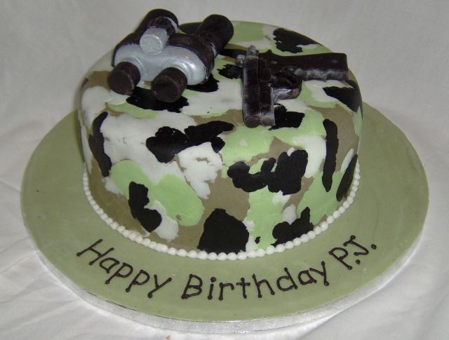 Army theme camo cake with binoculars and pistol.JPG