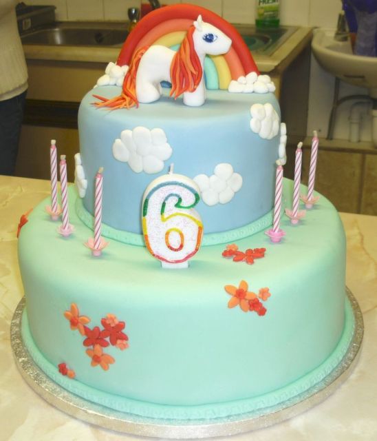 Girl's 6th birthday cake with pony and rainbow.JPG