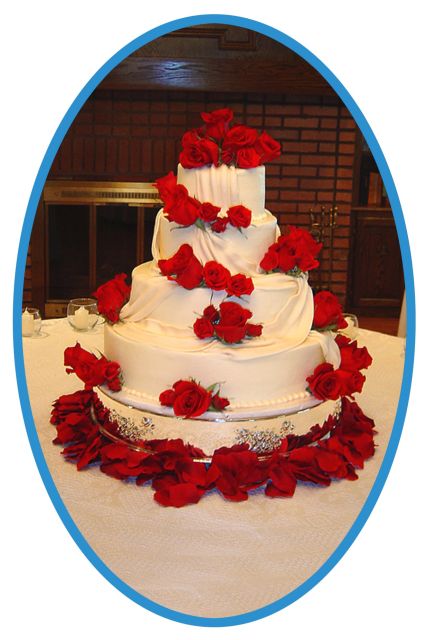 wedding cake with red roses