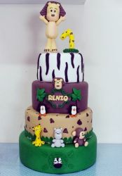 Safari Animal Cake in 4 Tiers with Lion on top.JPG