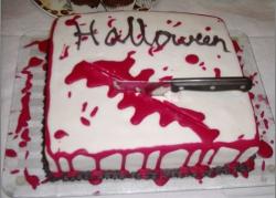 Bloody halloween cake with knife.JPG
