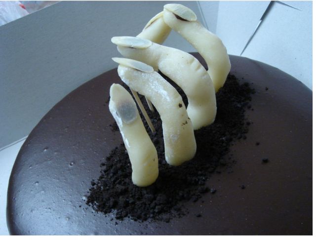 Chocolate zombie cake_a hand sticking up from the ground.JPG