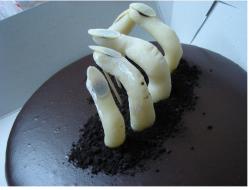 Chocolate zombie cake_a hand sticking up from the ground.JPG