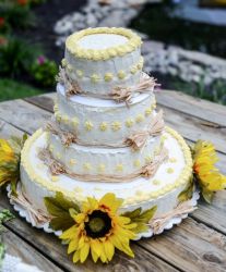 Autumn Theme Cake in 4 tiers with Yellow Flowers and Hay Straws.JPG