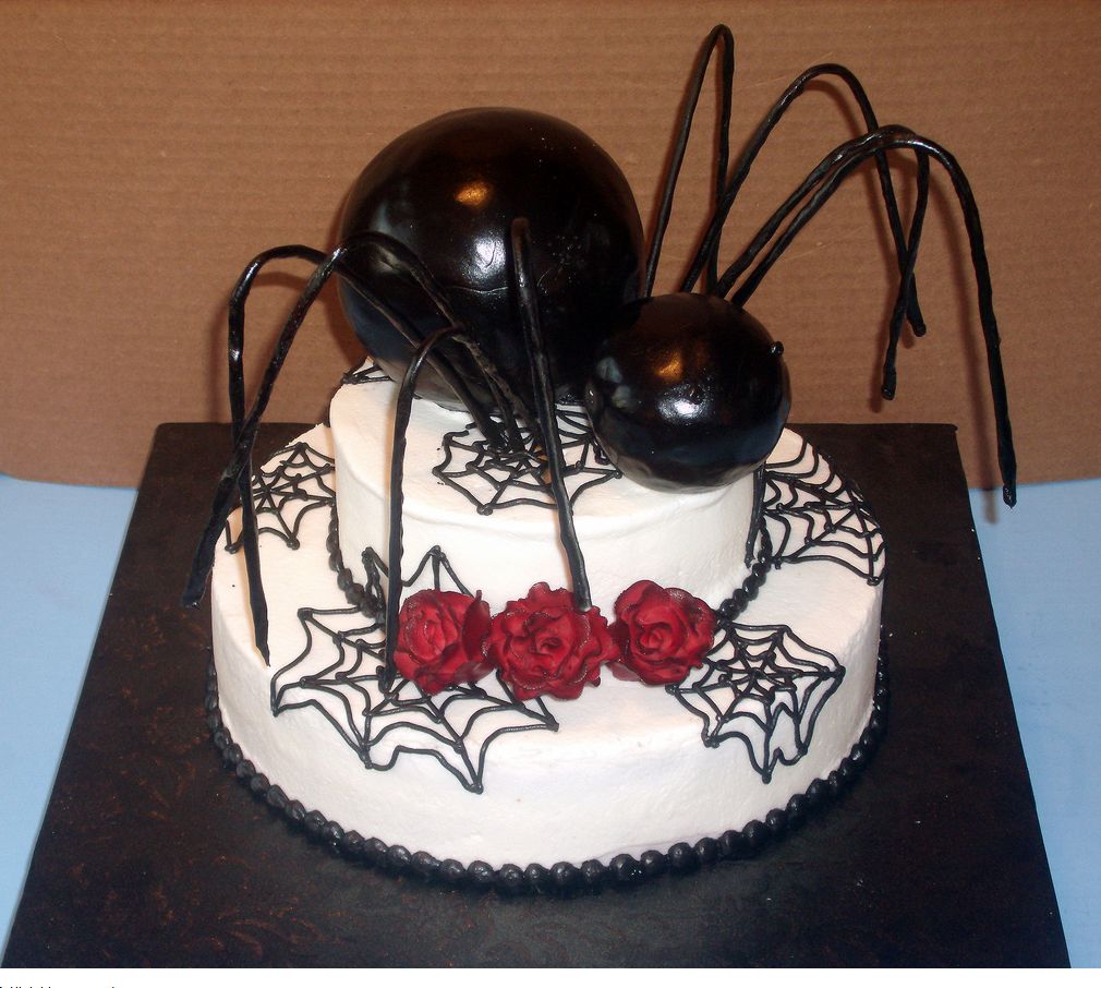 Picture of halloween cake with gaint spider topper.JPG
