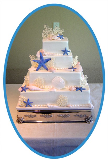 beach wedding cake with sea stars and seashells