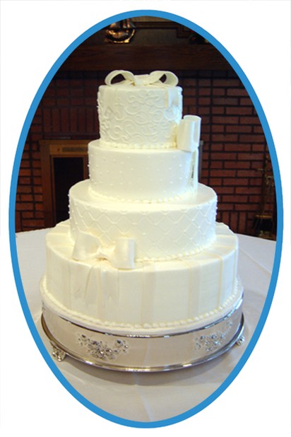 white wedding cake with elegant decor