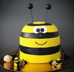 Striped Bee Yellow & Black Cake holding Ice Cream Cone.JPG