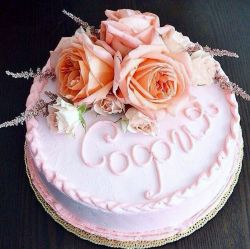 Pink Round Birthday Cake with Fresh Roses on top.JPG