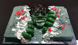 Incredible Hulk Breaking Through Cake.JPG