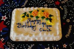 White Birday Cake with yellow flowers.jpg