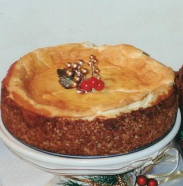Picture of White Chocolate cheesecake with Christmas cake decor.PNG