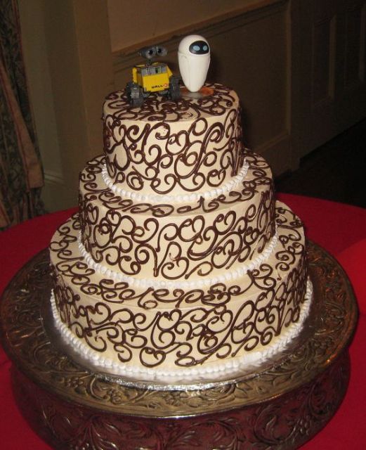 Three tier wedding cake with Wall-E toppers.JPG