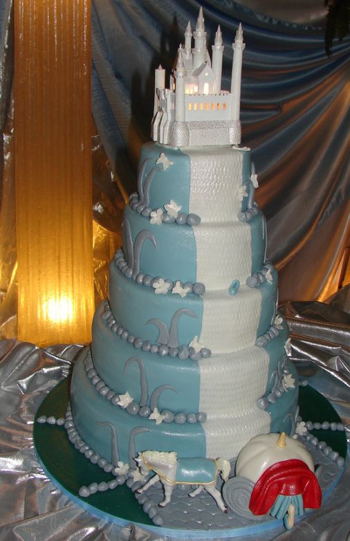Five tier white castle cake in teal and white.JPG