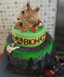 Zombie Cake with zombie hand stick up.JPG
