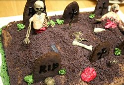 Zombie graveyard cake with full of zombies.JPG