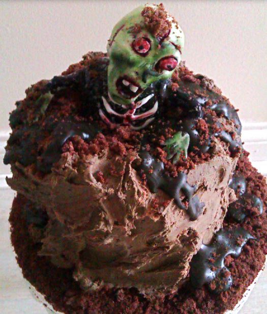 Zombie Birthday Cake with zombie coming out from the garveyard.JPG
