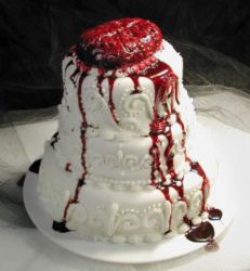 Bloody looking halloween wedding cake with bleeding brain cake topper.JPG