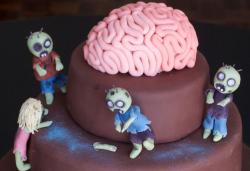 Chocolate zombie cake with full of fondant zombie cake decoration and fondant brain cake topper.JPG