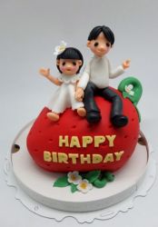 Personalized Father & Daughter Toppers on Strawberry Shaped Birthday Cake.JPG