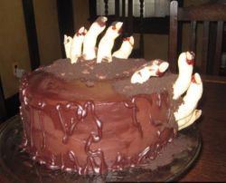 Homemade chocolate halloween cake with creepy hands sticking out.JPG