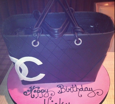 Chanel tote cake in black with white Chanel logo.PNG