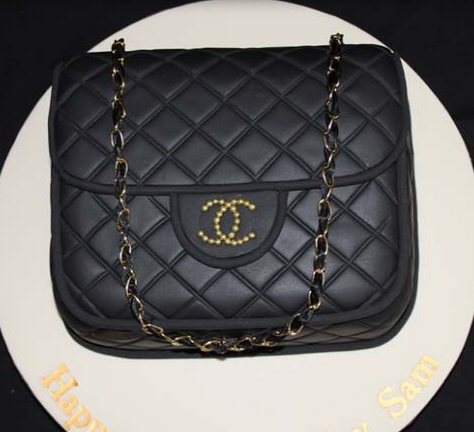 Classic Chanel leather purse cake with gold strap.PNG