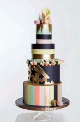 4 Tier Striped Cake with Macaroons & Candies.JPG