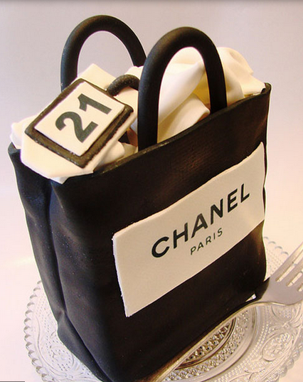 Black Chanel shopping bag cake photos.PNG